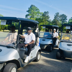 Golf carts heading out to the course